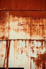 Old buildings covered with rust. Texture of old metal covered with rust background
Metal agricultural silos.