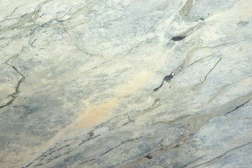 A slab of natural stone of a gray-pink color is called