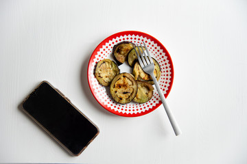 Grilled eggplant with smart phone