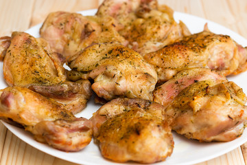 A plate of fresh, roasted chicken.