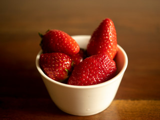 strawberries in a white bowl