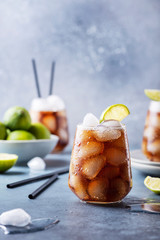 cocktail Cuba libre with rum, lime and cola