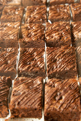 Closeup of homemade chocolate brownies that are baked on a tray