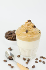 Dalgona Korean coffee with decorated coffee beans on the top