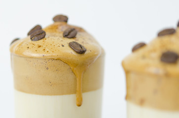 Dalgona Korean coffee with decorated coffee beans on the top