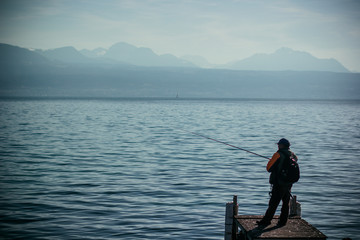 fisherman on the lake