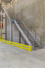 Metal staircase in a new modern warehouse