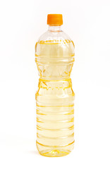 vegetable or sunflower oil in plastic bottle isolated on white background