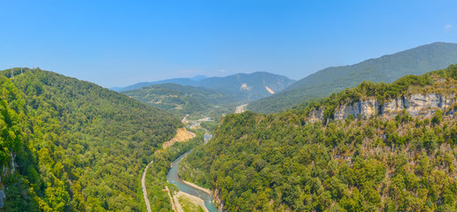 Panorama of the Akhshtyr Gorge and the Mzymty River in Sochi. Mountain landscape of southern Russia