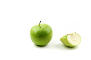 green apple and half of apple isolated on white background