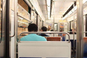 a black man in a metro in paris