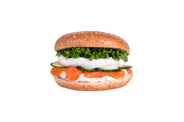 Fresh burger with salmon, philadelphia cheese, feta cheese, cucumber, salad mix isolated on white background.