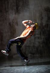Fototapeta na wymiar young modern hip hop male dancer