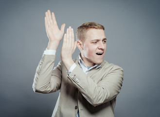 Gesture of businessman clap his hands