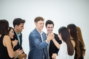 Obraz premium successful negotiation business men shake hand with partner to celebration partnership and teamwork