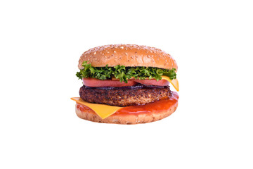 Fresh burger with chicken cutlet, grilled tomatoes, pickled cucumber, cheddar cheese, salad mix, caramelized onions, barbecue sauce, isolated on white background.