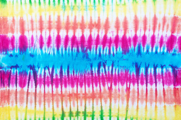 tie dye pattern hand dyed on cotton fabric abstract texture background.