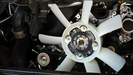 Modern system of cooling with a large fan blades from the car engine closeup,  car cooling fan...