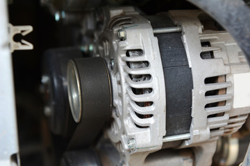 Fototapeta na wymiar closeup car timing belt or engine belt in the dirty engine room