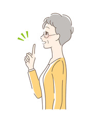 笑顔で指をさす女性の横顔