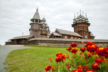 Kizhi island, Onega lake, Karelia, Russia.  In the foreground Orthodox Church of the Intercession of the Virgin in Kizhi Pogost.
