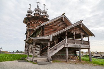 Kizhi island, Onega lake, Karelia, Russia.  In the foreground Orthodox Church of the Intercession of the Virgin in Kizhi Pogost.