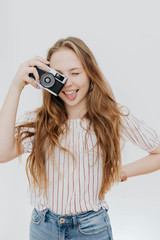 Girl with an analog camera