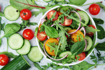A bowl full of vegetable salad