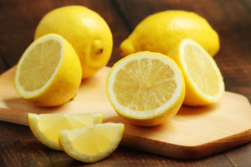 Lemons lying on the wooden rustic table