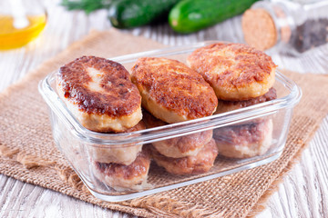 Homemade meat cutlets in a food container. Healthy food