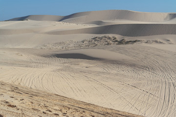 The White Sand Dunes of Mui Ne. Desert with traces of ATVs