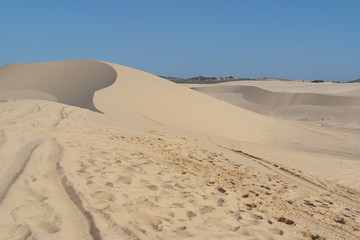 The White Sand Dunes of Mui Ne. Desert with traces of ATVs