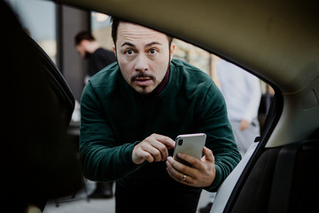 Man riding a car