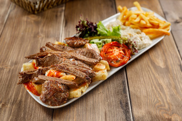 grilled meatballs served with butter service