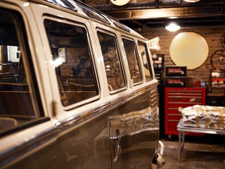 Vintage van garage with vans parked.