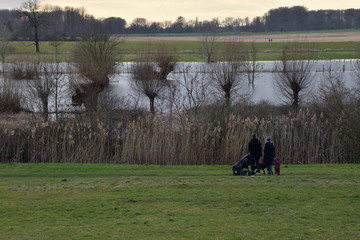 Family on a walk during the flood.