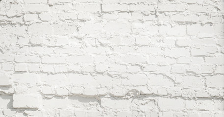 White brick wall background. Neutral texture of a brick wall close-up.