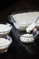 Three glass of sweet rice being served