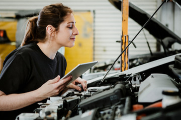 Female mechanic at a garage