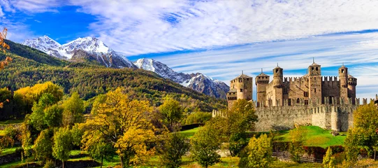 Gartenposter Medieval castles of Italy - beautiful Castello di Fenis in Valle d'Aosta surrounded by Alps mountains © Freesurf