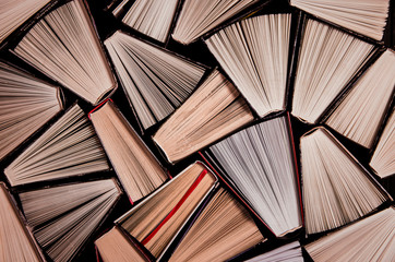 Many old books in a book shop or library. Shallow DOF