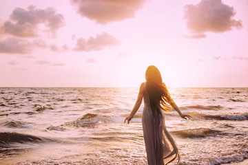 Art dark mysterious silhouette woman on sea shore nature air. Meditation prayer spiritual blessing...