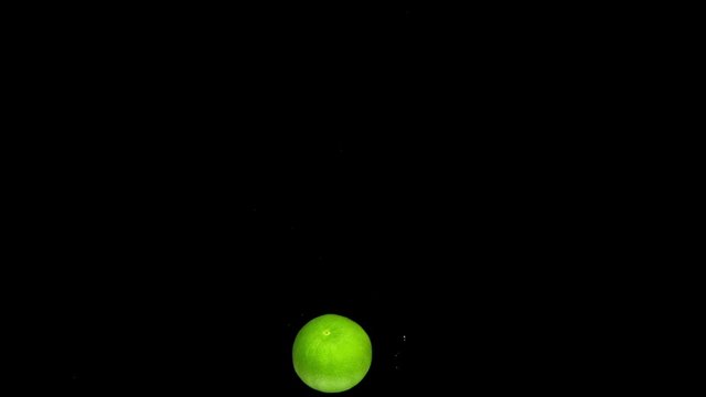 lime drop in water slower motion