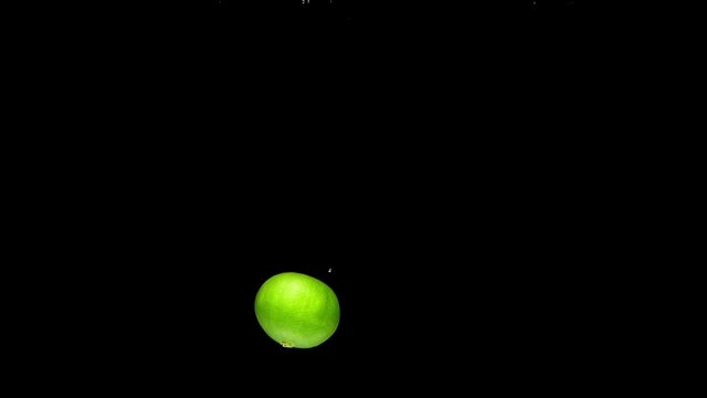 lime drop in water slower motion
