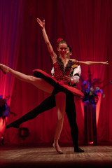 Duet young girl ballerina and a young man dancing ballet performance on stage in a theater © Kozlik_mozlik