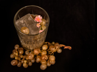 Gin and tonic with grapes
