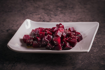 Healthy breakfast with boiled beetroot bowl and seeds