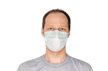 Man in surgical mask protection against contagious disease corona virus, hygienic mask to prevent...