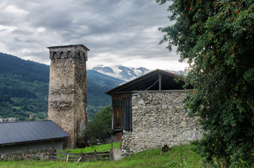 Medieval ancient Svan towers in the mountains of the Caucasus. Towers of a house in the Svaneti region in the mountains of Georgia. Stone towers built in the Middle Ages.