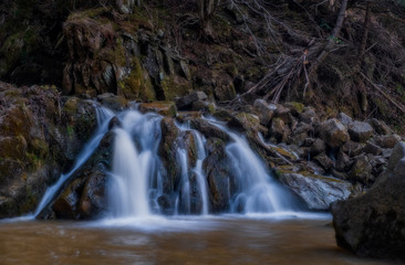 Kamyanka waterfall in Ukrainian Carpathian mountains. Long exposure shot, april 2020